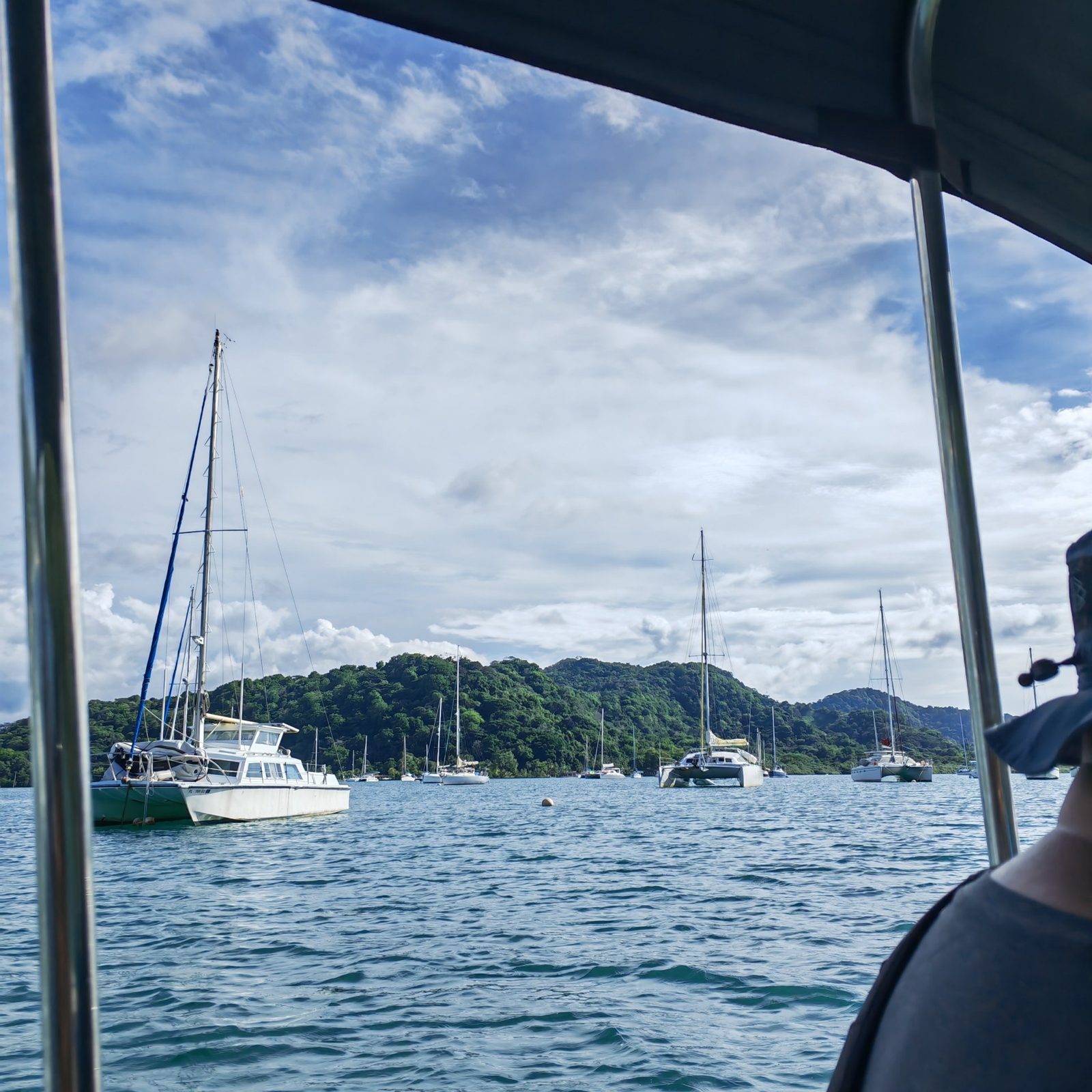 Sailboats anchored in the bay on the way to Isla Grande