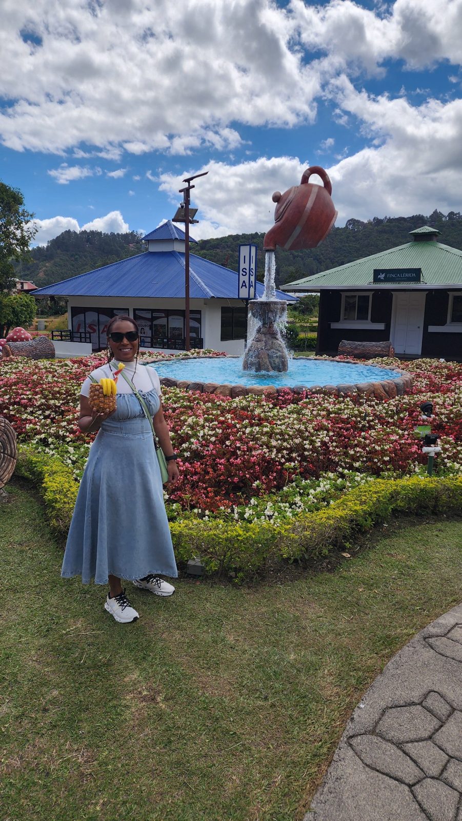 Teapot fountain and flower garden in the highlands